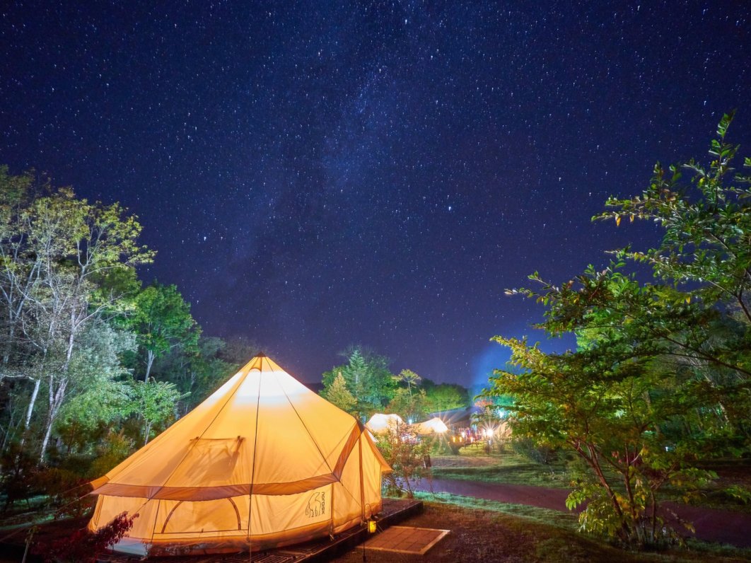 Starry night sky from a campsite beside Lake Kussharo